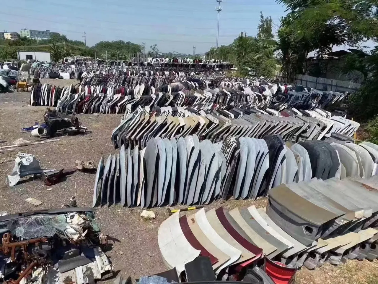Large stock of vehicle exterior body panels and bumpers
