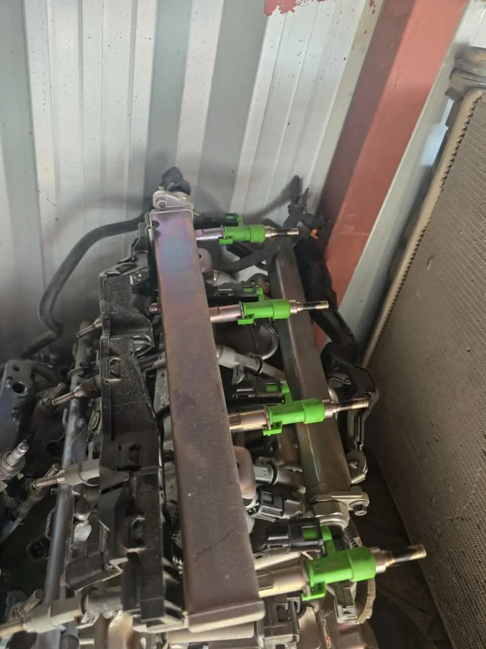 Fuel rail and injector assemblies